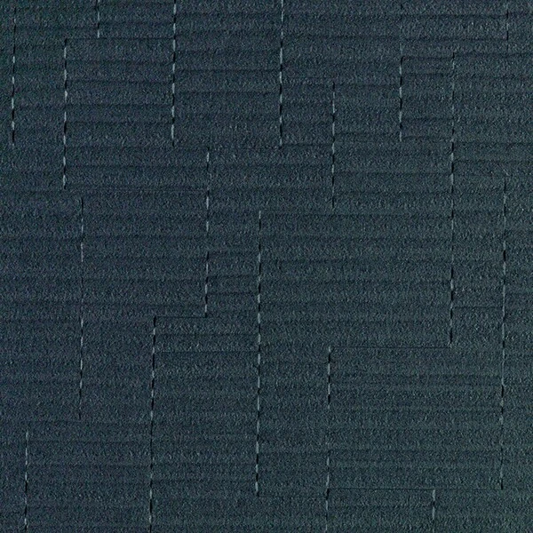 さりげないデザイン入り塗り壁調壁紙